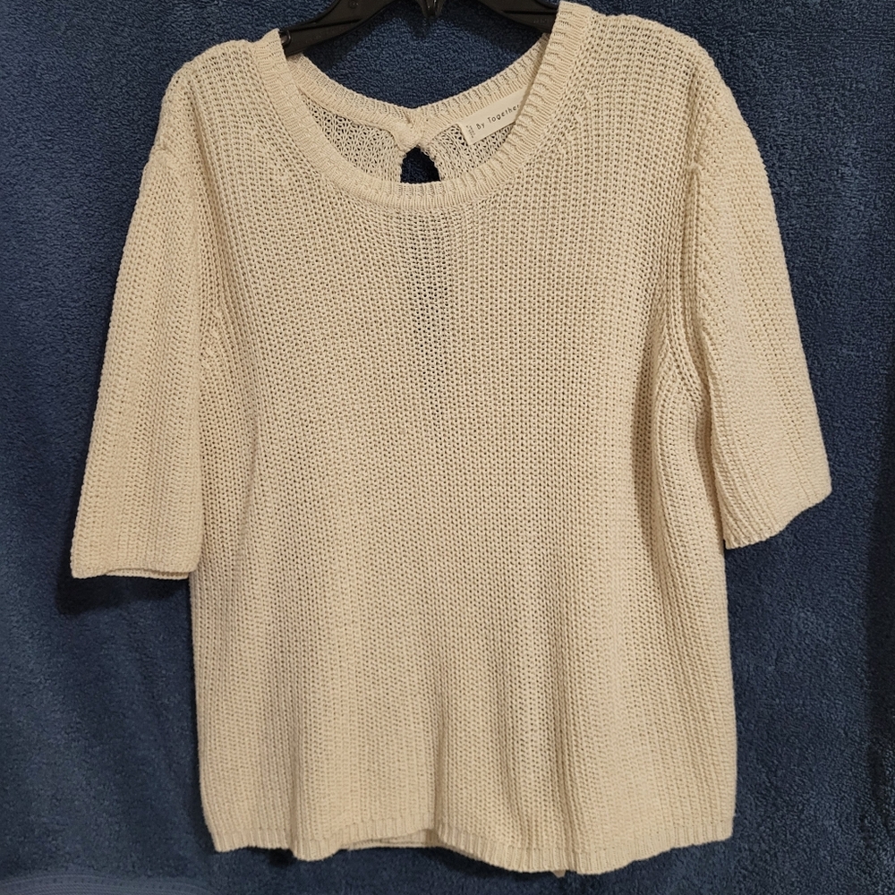 Cream Knit Short Sleeve Sweater with Keyhole Opening In Back.  Size Med.